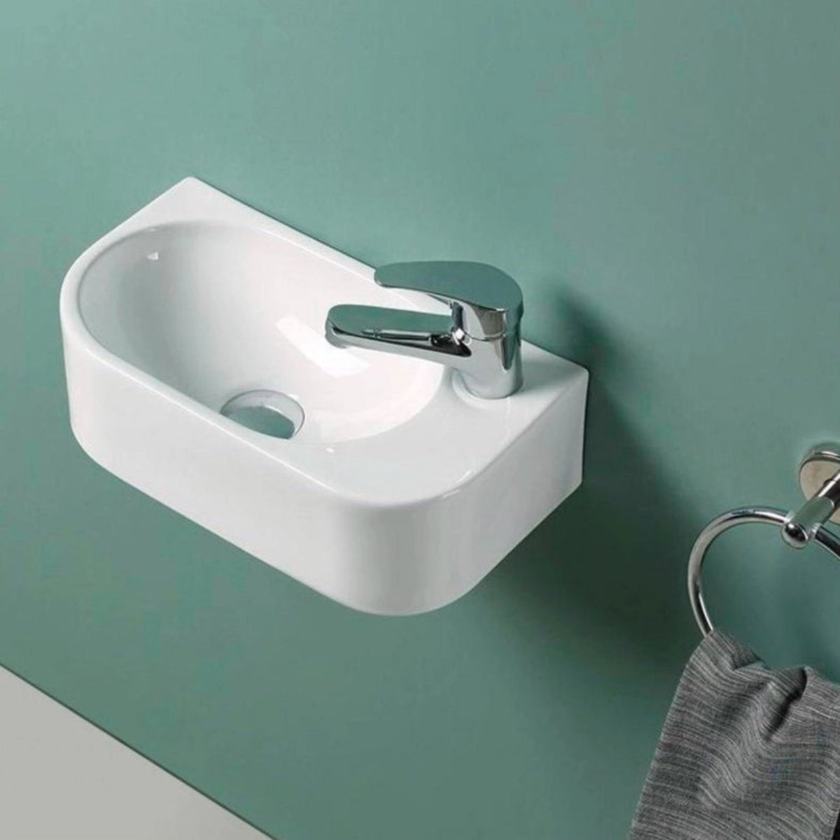 Lavabo pequeño suspendido Ovalado